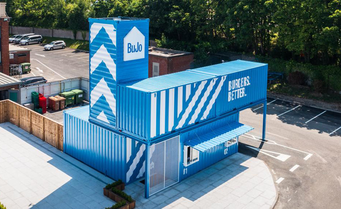 Aerial View of shipping container restaurant - Bujo Burgers