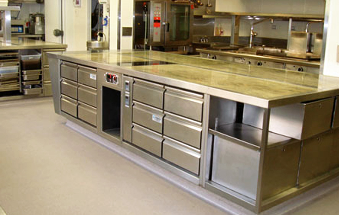 Kicthen with stainless steel and stone counter tops